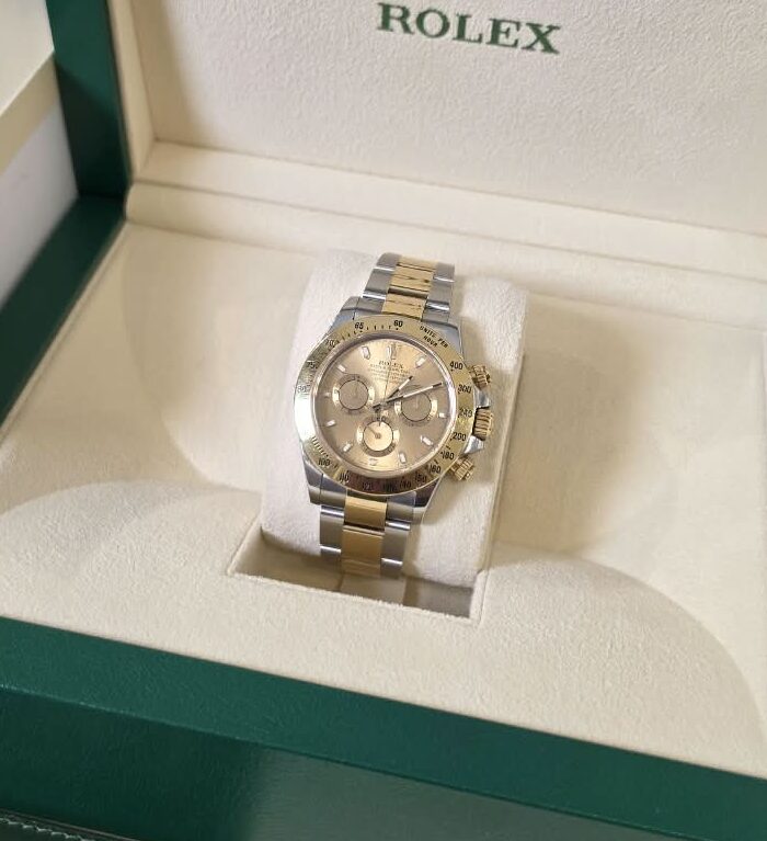 Rolex Cosmograph Daytona Gold Steel Champagne Dial|116523